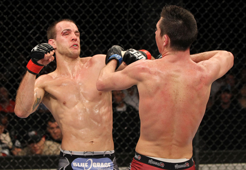 SYDNEY, AUSTRALIA - MARCH 03: (R-L) Steven Siler and Cole Miller trade punches in a featherweight bout during the UFC on FX event at Allphones Arena on March 3, 2012 in Sydney, Australia. (Photo by Josh Hedges/Zuffa LLC/Zuffa LLC via Getty Images) *** Local Caption *** Cole Miller; Steven Siler