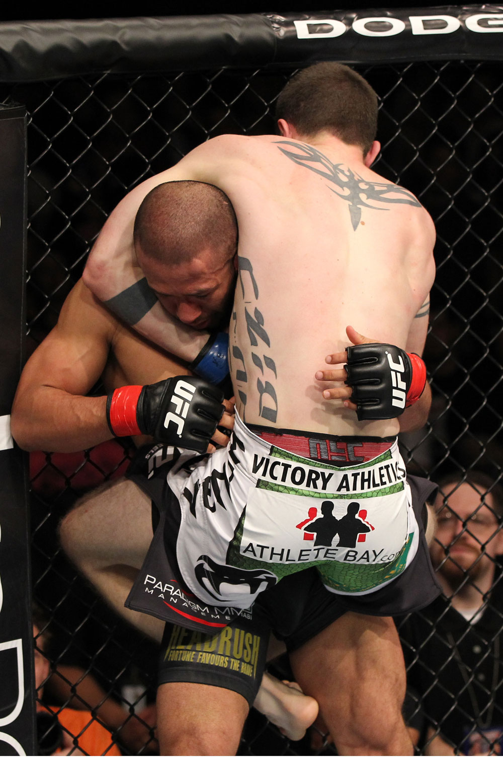 OMAHA, NE - FEBRUARY 15: (R-L) John Albert attempts a guillotine choke submission against Ivan Menjivar during the UFC on FUEL TV event at Omaha Civic Auditorium on February 15, 2012 in Omaha, Nebraska. (Photo by Josh Hedges/Zuffa LLC/Zuffa LLC via Getty Images) *** Local Caption *** Ivan Menjivar; John Albert