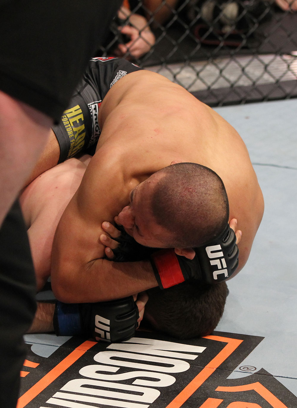 OMAHA, NE - FEBRUARY 15: Ivan Menjivar defeats John Albert with a rear choke submission during the UFC on FUEL TV event at Omaha Civic Auditorium on February 15, 2012 in Omaha, Nebraska. (Photo by Josh Hedges/Zuffa LLC/Zuffa LLC via Getty Images) *** Local Caption *** Ivan Menjivar; John Albert