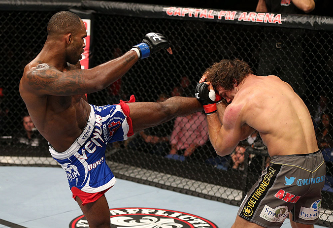 NOTTINGHAM, ENGLAND - SEPTEMBER 29: (L-R) Jimi Manuwa kicks Kyle Kingsbury during their light heavyweight fight at the UFC on Fuel TV event at Capital FM Arena on September 29, 2012 in Nottingham, England. (Photo by Josh Hedges/Zuffa LLC/Zuffa LLC via Getty Images)