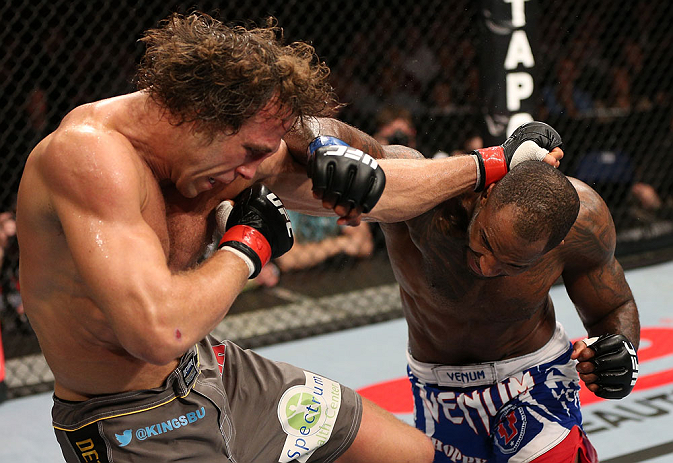 NOTTINGHAM, ENGLAND - SEPTEMBER 29: (R-L) Jimi Manuwa punches Kyle Kingsbury during their light heavyweight fight at the UFC on Fuel TV event at Capital FM Arena on September 29, 2012 in Nottingham, England. (Photo by Josh Hedges/Zuffa LLC/Zuffa LLC via Getty Images)