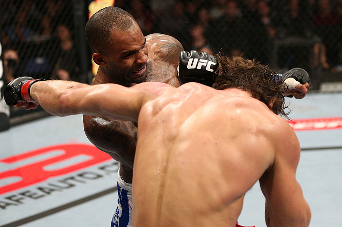 NOTTINGHAM, ENGLAND - SEPTEMBER 29: (L-R) Jimi Manuwa punches Kyle Kingsbury during their light heavyweight fight at the UFC on Fuel TV event at Capital FM Arena on September 29, 2012 in Nottingham, England. (Photo by Josh Hedges/Zuffa LLC/Zuffa LLC via Getty Images)