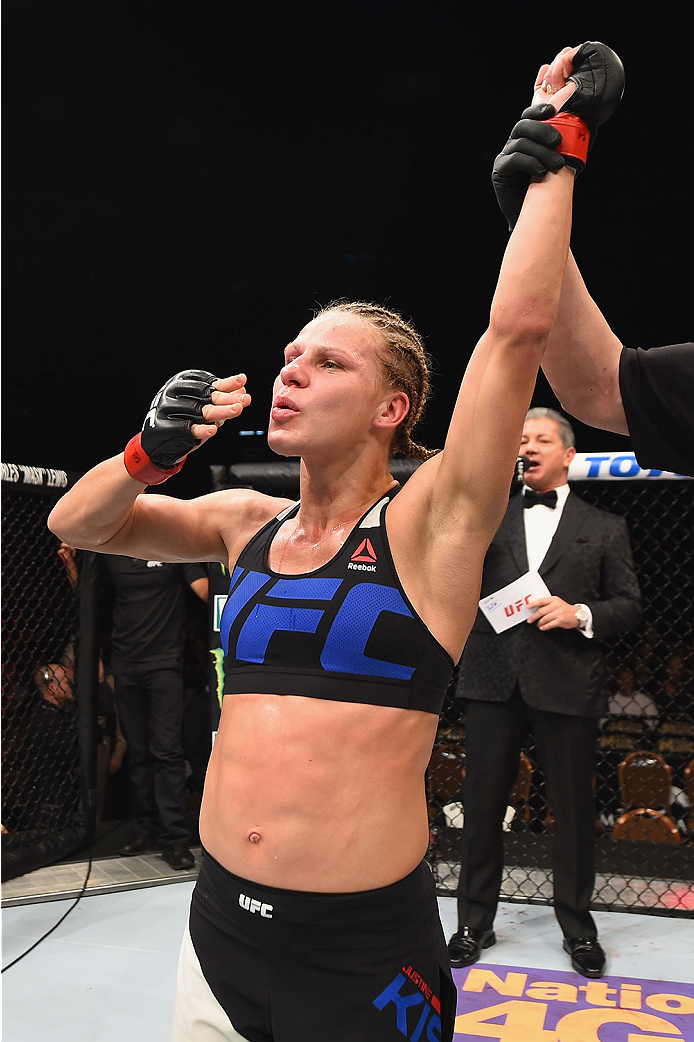 Justine Kish reacts to her victory over <a href='../fighter/nina-ansaroff'>Nina Ansaroff</a> during their bout at UFC 195