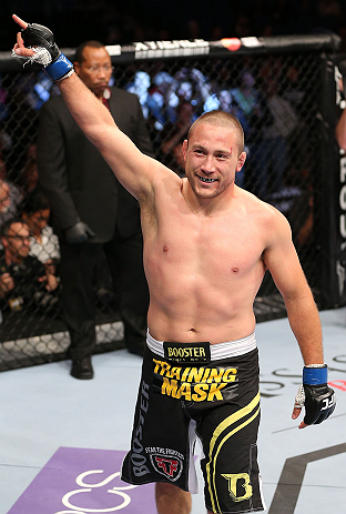 MINNEAPOLIS, MN - OCTOBER 05: Mike Pierce reacts after knocking out Aaron Simpson during their welterweight fight at the UFC on FX event at Target Center on October 5, 2012 in Minneapolis, Minnesota. (Photo by Josh Hedges/Zuffa LLC/Zuffa LLC via Getty Images)