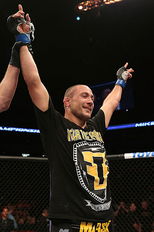 MINNEAPOLIS, MN - OCTOBER 05: Mike Pierce reacts after knocking out Aaron Simpson during their welterweight fight at the UFC on FX event at Target Center on October 5, 2012 in Minneapolis, Minnesota. (Photo by Josh Hedges/Zuffa LLC/Zuffa LLC via Getty Images)