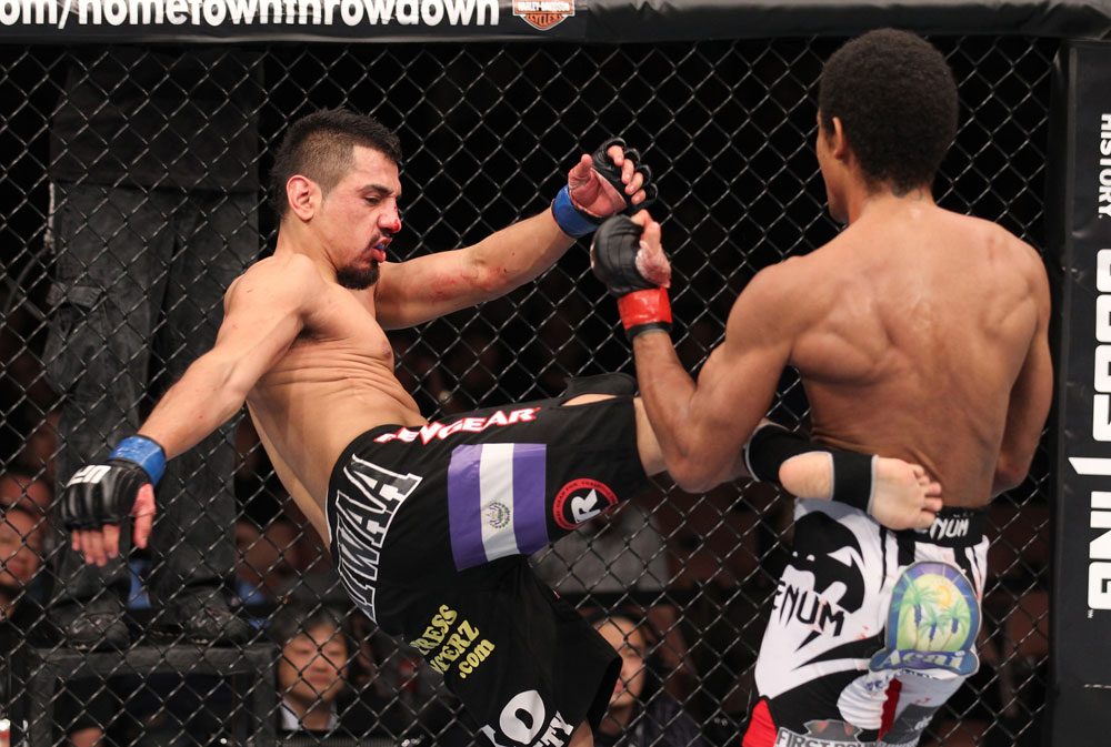 LAS VEGAS, NV - FEBRUARY 04:  Edwin Figueroa (left) kicks Alex Caceres during the UFC 143 event at Mandalay Bay Events Center on February 4, 2012 in Las Vegas, Nevada.  (Photo by Nick Laham/Zuffa LLC/Zuffa LLC via Getty Images) *** Local Caption *** Edwin Figueroa; Alex Caceres