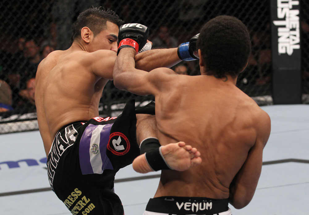 LAS VEGAS, NV - FEBRUARY 04:  Edwin Figueroa (left) kicks Alex Caceres during the UFC 143 event at Mandalay Bay Events Center on February 4, 2012 in Las Vegas, Nevada.  (Photo by Nick Laham/Zuffa LLC/Zuffa LLC via Getty Images) *** Local Caption *** Edwin Figueroa; Alex Caceres