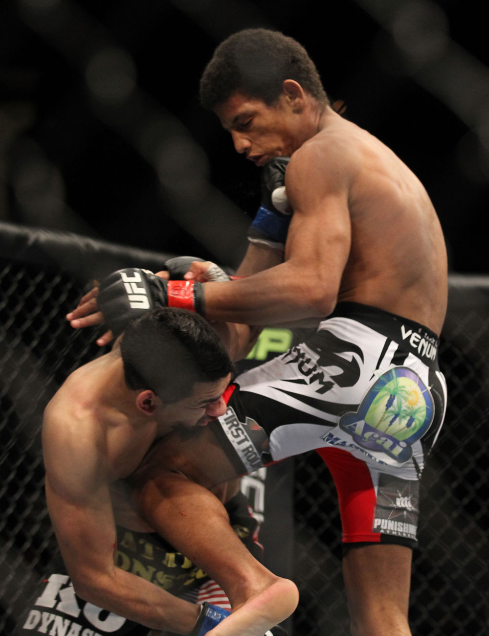 LAS VEGAS, NV - FEBRUARY 04:  Alex Caceres (white shorts) and Edwin Figueroa exchange blows during the UFC 143 event at Mandalay Bay Events Center on February 4, 2012 in Las Vegas, Nevada.  (Photo by Josh Hedges/Zuffa LLC/Zuffa LLC via Getty Images) *** Local Caption *** Alex Caceres; Edwin Figueroa