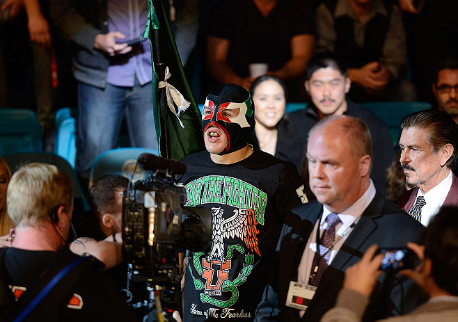 LAS VEGAS, NV - DECEMBER 29:  Erik Perez (center) walks to the Octagon to face Byron Bloodworth before their bantamweight fight at UFC 155 on December 29, 2012 at MGM Grand Garden Arena in Las Vegas, Nevada. (Photo by Donald Miralle/Zuffa LLC/Zuffa LLC via Getty Images) *** Local Caption *** Erik Perez; Byron Bloodworth