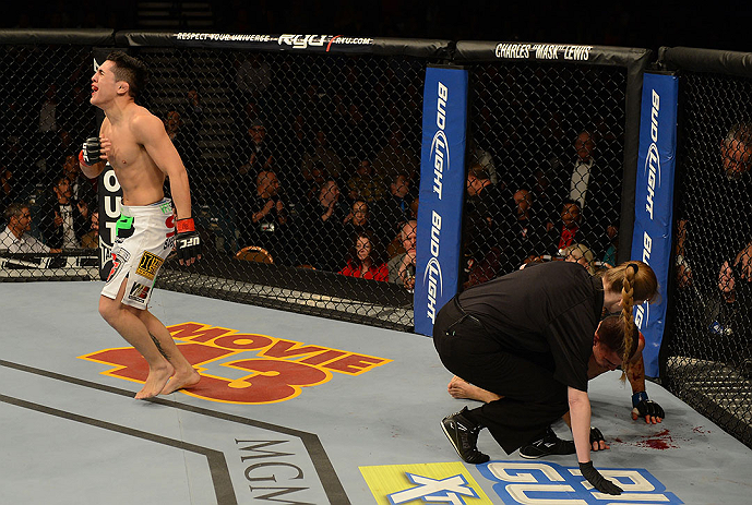 LAS VEGAS, NV - DECEMBER 29:  Erik Perez (left) reacts to his victory over Byron Bloodworth during their bantamweight fight at UFC 155 on December 29, 2012 at MGM Grand Garden Arena in Las Vegas, Nevada. (Photo by Donald Miralle/Zuffa LLC/Zuffa LLC via Getty Images) *** Local Caption *** Erik Perez; Byron Bloodworth