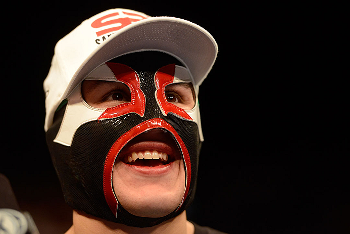 LAS VEGAS, NV - DECEMBER 29:  Erik Perez wearing a lucha libre mask after his victory over Byron Bloodworth at UFC 155 on December 29, 2012 at MGM Grand Garden Arena in Las Vegas, Nevada. (Photo by Donald Miralle/Zuffa LLC/Zuffa LLC via Getty Images) *** Local Caption *** Erik Perez; Byron Bloodworth