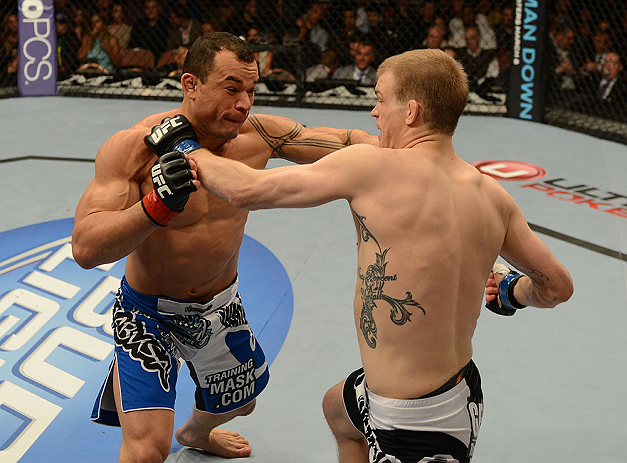 LAS VEGAS, NV - FEBRUARY 02: (L-R) Gleison Tibau punches Evan Dunham during their lightweight fight at UFC 156 on February 2, 2013 at the Mandalay Bay Events Center in Las Vegas, Nevada. (Photo by Donald Miralle/Zuffa LLC/Zuffa LLC via Getty Images) *** Local Caption *** Gleison Tibau; Evan Dunham