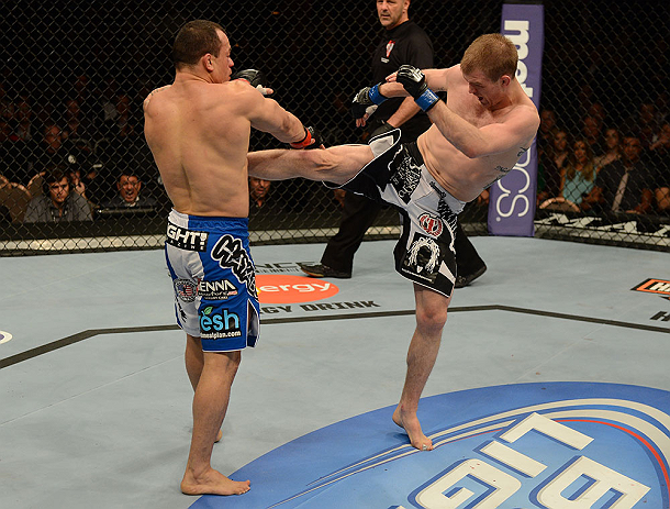 LAS VEGAS, NV - FEBRUARY 02: (R-L) Evan Dunham kicks Gleison Tibau during their lightweight fight at UFC 156 on February 2, 2013 at the Mandalay Bay Events Center in Las Vegas, Nevada. (Photo by Donald Miralle/Zuffa LLC/Zuffa LLC via Getty Images) *** Local Caption *** Gleison Tibau; Evan Dunham