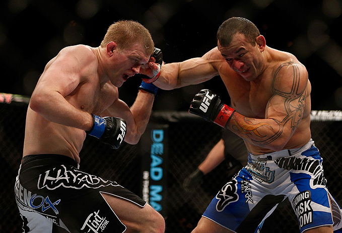 LAS VEGAS, NV - FEBRUARY 02: (R-L) Gleison Tibau punches Evan Dunham during their lightweight fight at UFC 156 on February 2, 2013 at the Mandalay Bay Events Center in Las Vegas, Nevada. (Photo by Josh Hedges/Zuffa LLC/Zuffa LLC via Getty Images) *** Local Caption *** Gleison Tibau; Evan Dunham