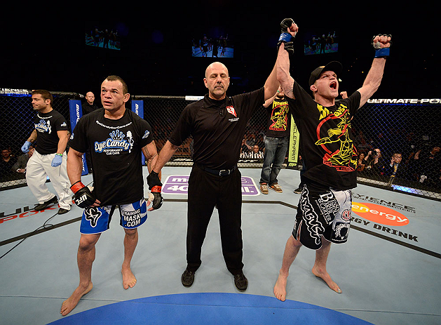 LAS VEGAS, NV - FEBRUARY 02: Evan Dunham (right) reacts to his victory over Gleison Tibau after their lightweight fight at UFC 156 on February 2, 2013 at the Mandalay Bay Events Center in Las Vegas, Nevada. (Photo by Donald Miralle/Zuffa LLC/Zuffa LLC via Getty Images) *** Local Caption *** Gleison Tibau; Evan Dunham
