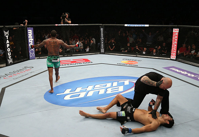 MINNEAPOLIS, MN - OCTOBER 05: Michael Johnson (L) reacts after knocking out Danny Castillo during their lightweight fight at the UFC on FX event at Target Center on October 5, 2012 in Minneapolis, Minnesota. (Photo by Josh Hedges/Zuffa LLC/Zuffa LLC via Getty Images)
