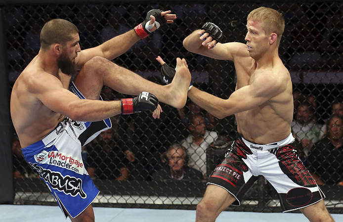 CALGARY, CANADA - JULY 21: (L-R) Court McGee exchanges contact with Nick Ring during their middleweight bout at UFC 149 inside the Scotiabank Saddledome on July 21, 2012 in Calgary, Alberta, Canada.  (Photo by Nick Laham/Zuffa LLC/Zuffa LLC via Getty Images)