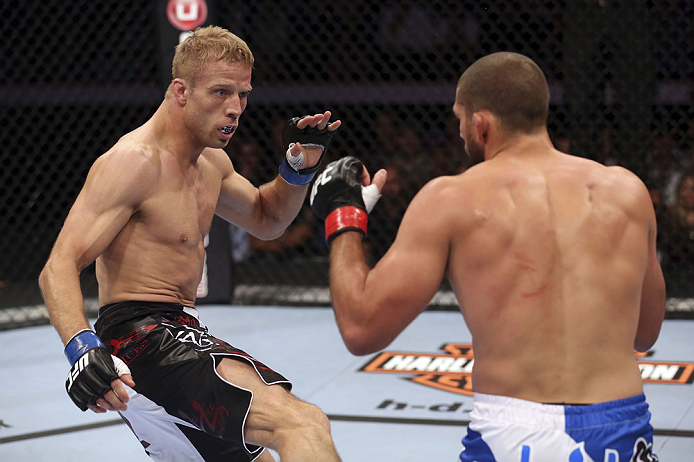 CALGARY, CANADA - JULY 21: (L-R) Nick Ring looks to strike against Court McGee during their middleweight bout at UFC 149 inside the Scotiabank Saddledome on July 21, 2012 in Calgary, Alberta, Canada.  (Photo by Nick Laham/Zuffa LLC/Zuffa LLC via Getty Images)
