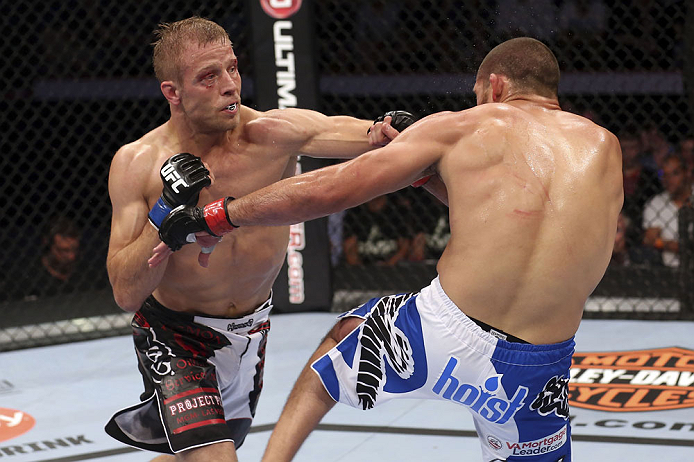 CALGARY, CANADA - JULY 21:  (L-R) Nick Ring lands a punch to the head of Court McGee during their middleweight bout at UFC 149 inside the Scotiabank Saddledome on July 21, 2012 in Calgary, Alberta, Canada.  (Photo by Nick Laham/Zuffa LLC/Zuffa LLC via Getty Images)