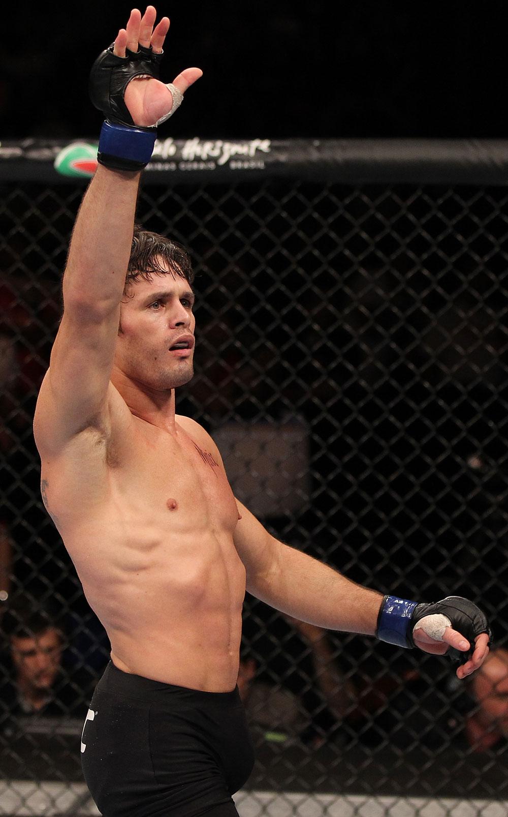 BELO HORIZONTE, BRAZIL - JUNE 23: Rodrigo Damm reacts after defeating Anistavio "Gasparzinho" Medeiros by submission during their UFC 147 featherweight bout at Estadio Jornalista Felipe Drummond on June 23, 2012 in Belo Horizonte, Brazil. (Photo by Josh Hedges/Zuffa LLC/Zuffa LLC via Getty Images)