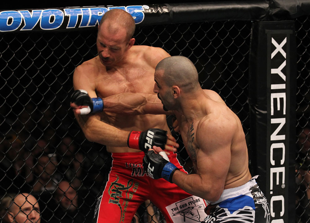 TORONTO, ON - DECEMBER 10:  (R-L) Constantinos Philippou punches Jared Hamman during the UFC 140 event at Air Canada Centre on December 10, 2011 in Toronto, Ontario, Canada.  (Photo by Nick Laham/Zuffa LLC/Zuffa LLC via Getty Images)