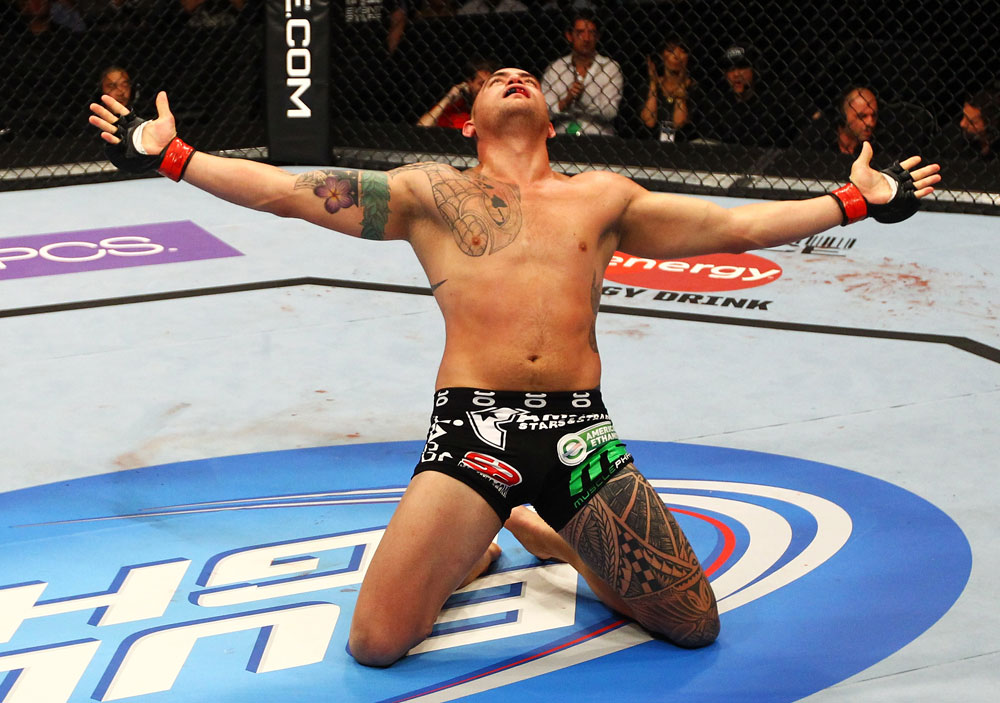 ATLANTA, GA - APRIL 21:  Travis Browne celebrates defeating Chad Griggs by tap out from an arm triangle during their heavyweight bout for UFC 145 at Philips Arena on April 21, 2012 in Atlanta, Georgia.  (Photo by Al Bello/Zuffa LLC/Zuffa LLC via Getty Images)