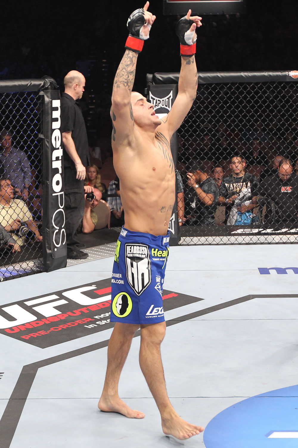 LAS VEGAS, NV - FEBRUARY 04:  Dustin Poirier reacts to his submission victory over Max Holloway during the UFC 143 event at Mandalay Bay Events Center on February 4, 2012 in Las Vegas, Nevada.  (Photo by Nick Laham/Zuffa LLC/Zuffa LLC via Getty Images) *** Local Caption *** Dustin Poirier