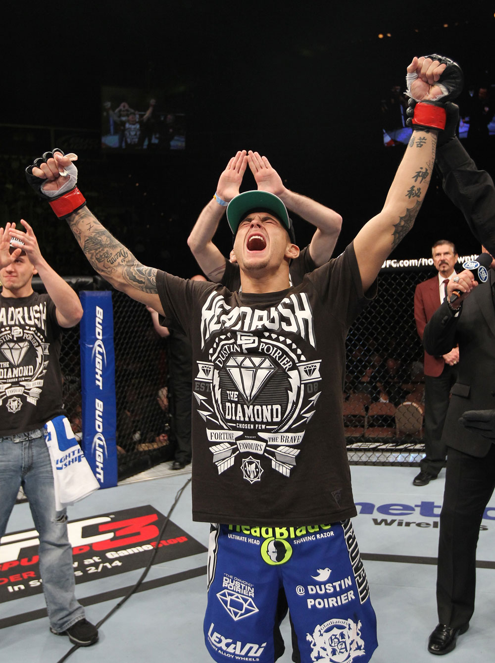 LAS VEGAS, NV - FEBRUARY 04:  Dustin Poirier reacts to being declared the winner in his fight against Max Holloway during the UFC 143 event at Mandalay Bay Events Center on February 4, 2012 in Las Vegas, Nevada.  (Photo by Nick Laham/Zuffa LLC/Zuffa LLC via Getty Images) *** Local Caption *** Dustin Poirier