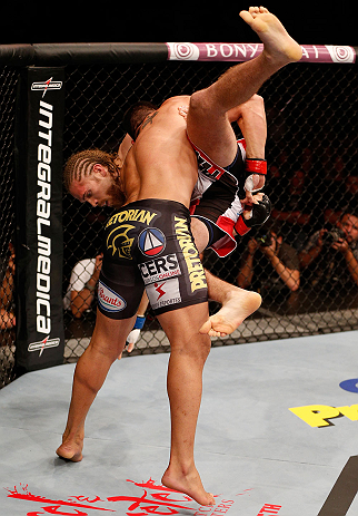 SAO PAULO, BRAZIL - JANUARY 19: (L-R) Ronny Markes takes down Andrew Craig in their middleweight fight at the UFC on FX event on January 19, 2013 at Ibirapuera Gymnasium in Sao Paulo, Brazil. (Photo by Josh Hedges/Zuffa LLC/Zuffa LLC via Getty Images)
