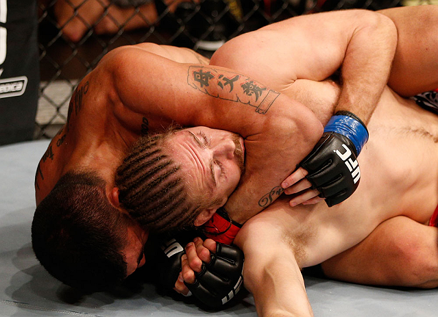 SAO PAULO, BRAZIL - JANUARY 19: (L-R) Ronny Markes attempts a rear choke submission against Andrew Craig in their middleweight fight at the UFC on FX event on January 19, 2013 at Ibirapuera Gymnasium in Sao Paulo, Brazil. (Photo by Josh Hedges/Zuffa LLC/Zuffa LLC via Getty Images)