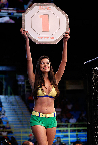 SAO PAULO, BRAZIL - JANUARY 19: UFC Octagon Girl Camila Rodrigues de Oliveira introduces a round during the UFC on FX event on January 19, 2013 at Ibirapuera Gymnasium in Sao Paulo, Brazil. (Photo by Josh Hedges/Zuffa LLC/Zuffa LLC via Getty Images)