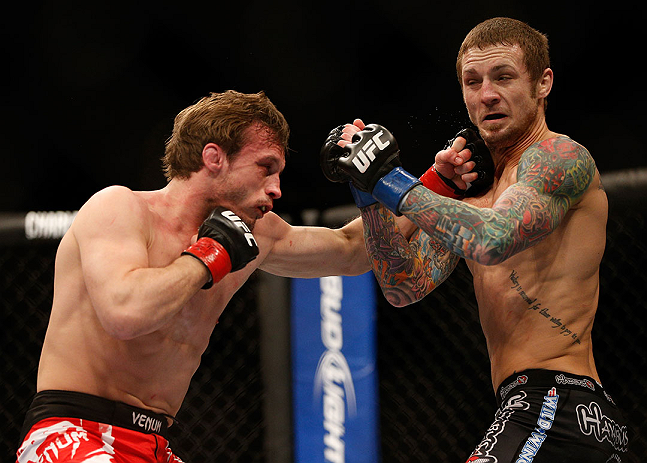 LAS VEGAS, NV - DECEMBER 29:  (L-R) Brad Pickett punches Eddie Wineland during their bantamweight fight at UFC 155 on December 29, 2012 at MGM Grand Garden Arena in Las Vegas, Nevada. (Photo by Josh Hedges/Zuffa LLC/Zuffa LLC via Getty Images) *** Local Caption *** Brad Pickett; Eddie Wineland