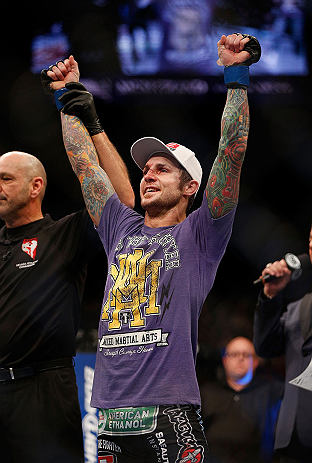 LAS VEGAS, NV - DECEMBER 29:  Eddie Wineland reacts to being declared the victor over Brad Pickett after their bantamweight fight at UFC 155 on December 29, 2012 at MGM Grand Garden Arena in Las Vegas, Nevada. (Photo by Josh Hedges/Zuffa LLC/Zuffa LLC via Getty Images) *** Local Caption *** Brad Pickett; Eddie Wineland