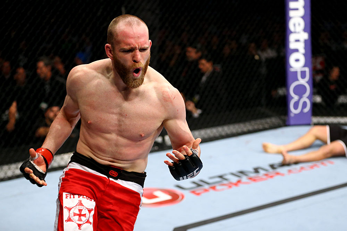 CHICAGO, IL - JANUARY 26:  TJ Grant celebrates after defeating Matt Wiman during their Lightweight Bout part of UFC on FOX at United Center on January 26, 2013 in Chicago, Illinois.  (Photo by Al Bello/Zuffa LLC/Zuffa LLC Via Getty Images)