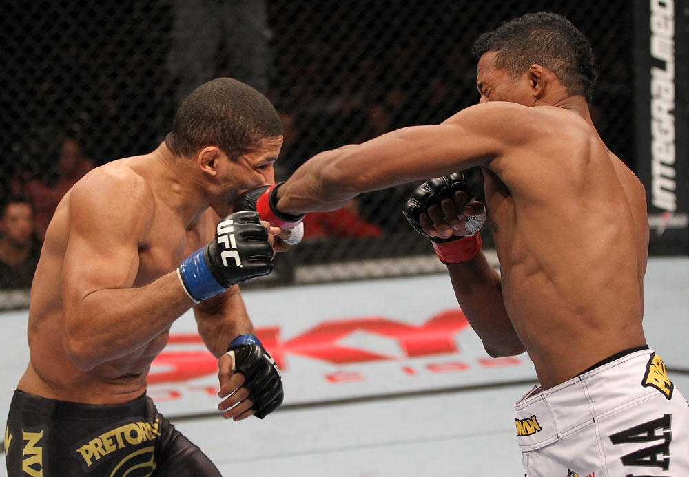 BELO HORIZONTE, BRAZIL - JUNE 23: (R-L) Yuri Alcantara punches Hacran Dias during their UFC 147 featherweight bout at Estadio Jornalista Felipe Drummond on June 23, 2012 in Belo Horizonte, Brazil. (Photo by Josh Hedges/Zuffa LLC/Zuffa LLC via Getty Images)