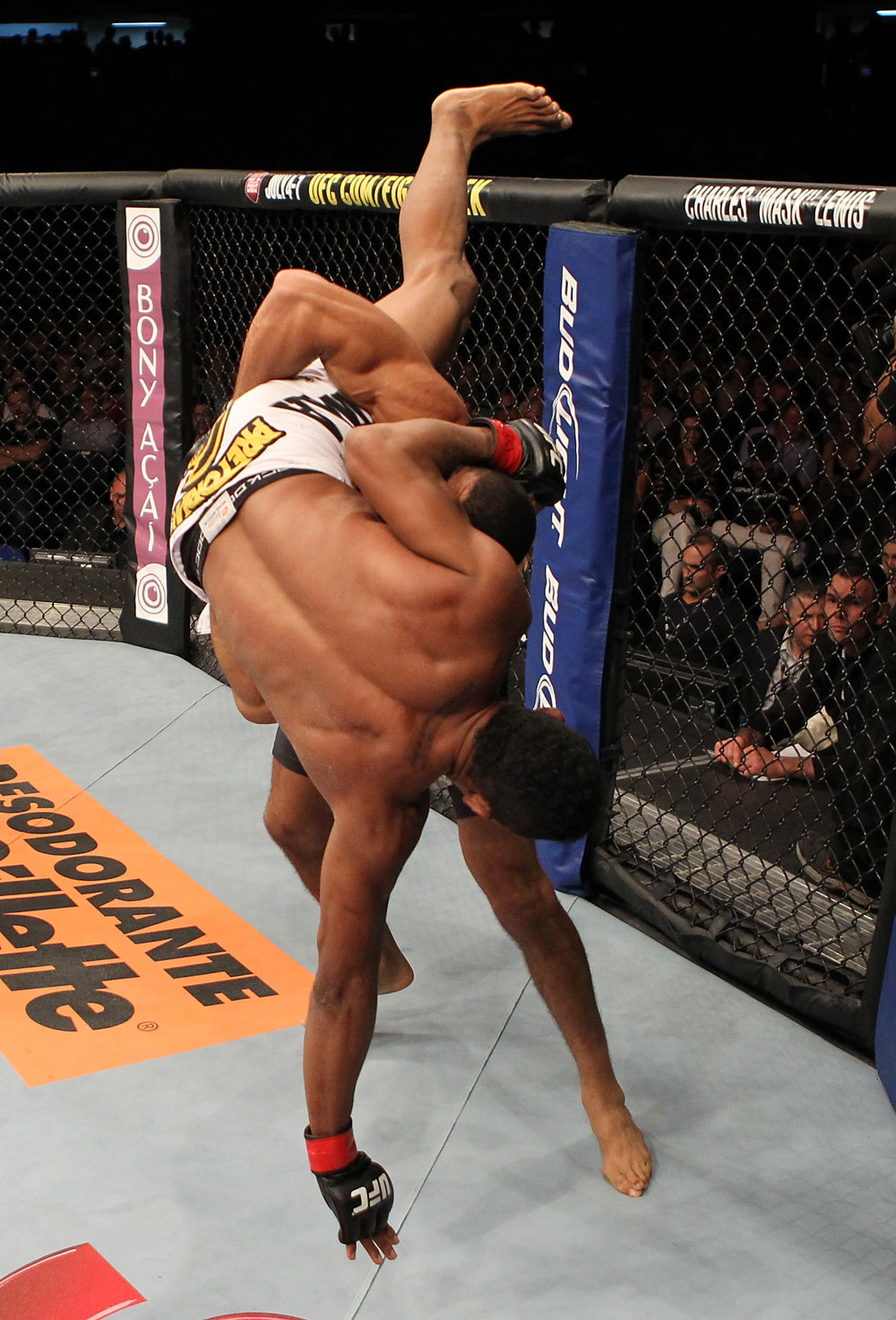 BELO HORIZONTE, BRAZIL - JUNE 23: (R-L) Hacran Dias takes down Yuri Alcantara during their UFC 147 featherweight bout at Estadio Jornalista Felipe Drummond on June 23, 2012 in Belo Horizonte, Brazil. (Photo by Josh Hedges/Zuffa LLC/Zuffa LLC via Getty Images)