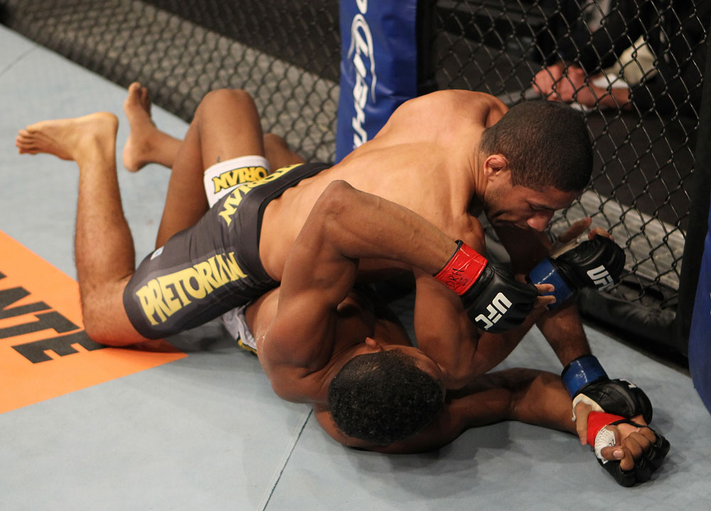 BELO HORIZONTE, BRAZIL - JUNE 23: Hacran Dias (top) delivers an elbow against Yuri Alcantara during their UFC 147 featherweight bout at Estadio Jornalista Felipe Drummond on June 23, 2012 in Belo Horizonte, Brazil. (Photo by Josh Hedges/Zuffa LLC/Zuffa LLC via Getty Images)