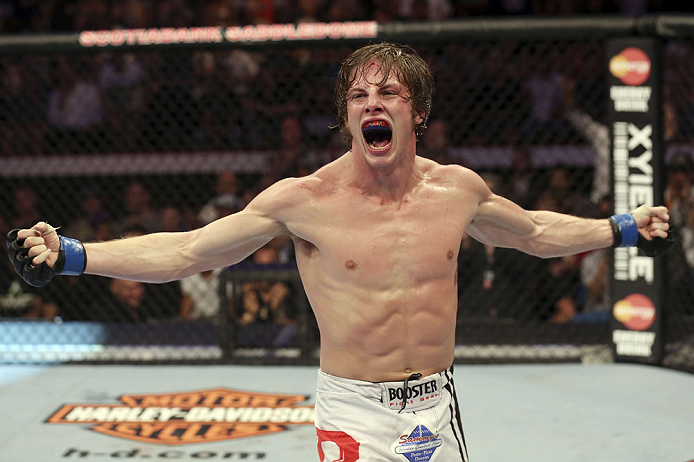 CALGARY, CANADA- JULY 21: Matthew Riddle celebrates after defeating Chris Clements during their welterweight bout at UFC 149 inside the Scotiabank Saddledome on July 21, 2012 in Calgary, Alberta, Canada.  (Photo by Nick Laham/Zuffa LLC/Zuffa LLC via Getty Images)