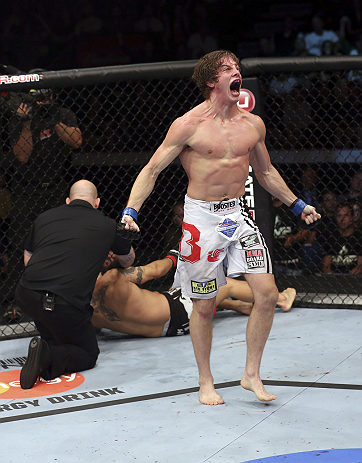 CALGARY, CANADA- JULY 21: Matthew Riddle celebrates after defeating Chris Clements during their welterweight bout at UFC 149 inside the Scotiabank Saddledome on July 21, 2012 in Calgary, Alberta, Canada.  (Photo by Nick Laham/Zuffa LLC/Zuffa LLC via Getty Images)
