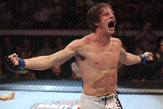 CALGARY, CANADA- JULY 21: Matthew Riddle celebrates after defeating Chris Clements during their welterweight bout at UFC 149 inside the Scotiabank Saddledome on July 21, 2012 in Calgary, Alberta, Canada.  (Photo by Nick Laham/Zuffa LLC/Zuffa LLC via Getty Images)