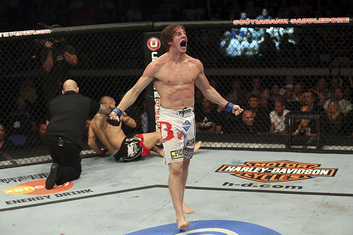 CALGARY, CANADA- JULY 21: Matthew Riddle celebrates after defeating Chris Clements during their welterweight bout at UFC 149 inside the Scotiabank Saddledome on July 21, 2012 in Calgary, Alberta, Canada.  (Photo by Nick Laham/Zuffa LLC/Zuffa LLC via Getty Images)