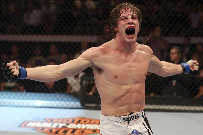 CALGARY, CANADA- JULY 21: Matthew Riddle celebrates after defeating Chris Clements during their welterweight bout at UFC 149 inside the Scotiabank Saddledome on July 21, 2012 in Calgary, Alberta, Canada.  (Photo by Nick Laham/Zuffa LLC/Zuffa LLC via Getty Images)