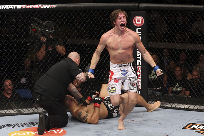 CALGARY, CANADA- JULY 21: Matthew Riddle celebrates after defeating Chris Clements during their welterweight bout at UFC 149 inside the Scotiabank Saddledome on July 21, 2012 in Calgary, Alberta, Canada.  (Photo by Nick Laham/Zuffa LLC/Zuffa LLC via Getty Images)