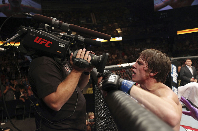 CALGARY, CANADA- JULY 21: Matthew Riddle celebrates after defeating Chris Clements during their welterweight bout at UFC 149 inside the Scotiabank Saddledome on July 21, 2012 in Calgary, Alberta, Canada.  (Photo by Nick Laham/Zuffa LLC/Zuffa LLC via Getty Images)