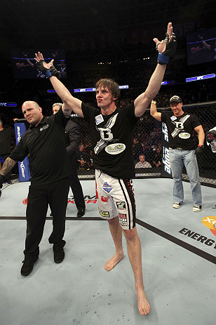 CALGARY, CANADA- JULY 21: Matthew Riddle celebrates after defeating Chris Clements during their welterweight bout at UFC 149 inside the Scotiabank Saddledome on July 21, 2012 in Calgary, Alberta, Canada.  (Photo by Nick Laham/Zuffa LLC/Zuffa LLC via Getty Images)