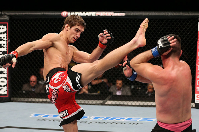 NOTTINGHAM, ENGLAND - SEPTEMBER 29: (L-R) John Hathaway kicks John Maguire during their welterweight fight at the UFC on Fuel TV event at Capital FM Arena on September 29, 2012 in Nottingham, England. (Photo by Josh Hedges/Zuffa LLC/Zuffa LLC via Getty Images)