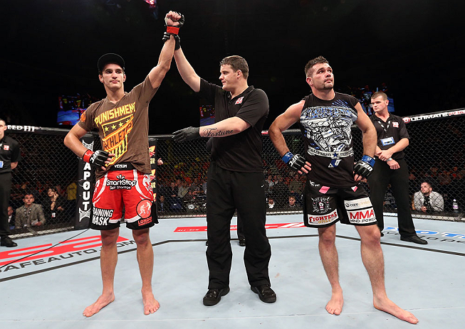 NOTTINGHAM, ENGLAND - SEPTEMBER 29: John Hathaway (L) reacts after defeating John Maguire (R) during their welterweight fight at the UFC on Fuel TV event at Capital FM Arena on September 29, 2012 in Nottingham, England. (Photo by Josh Hedges/Zuffa LLC/Zuffa LLC via Getty Images)