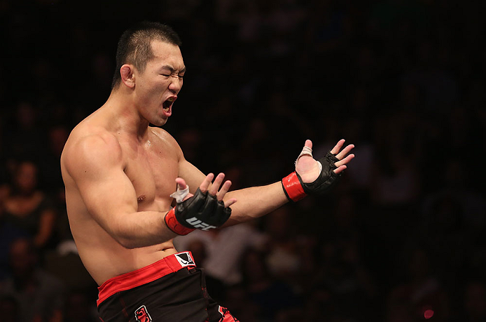 DENVER, CO - AUGUST 11: Yushin Okami reacts after defeating Buddy Roberts during their middleweight bout at UFC 150 inside Pepsi Center on August 11, 2012 in Denver, Colorado. (Photo by Nick Laham/Zuffa LLC/Zuffa LLC via Getty Images)