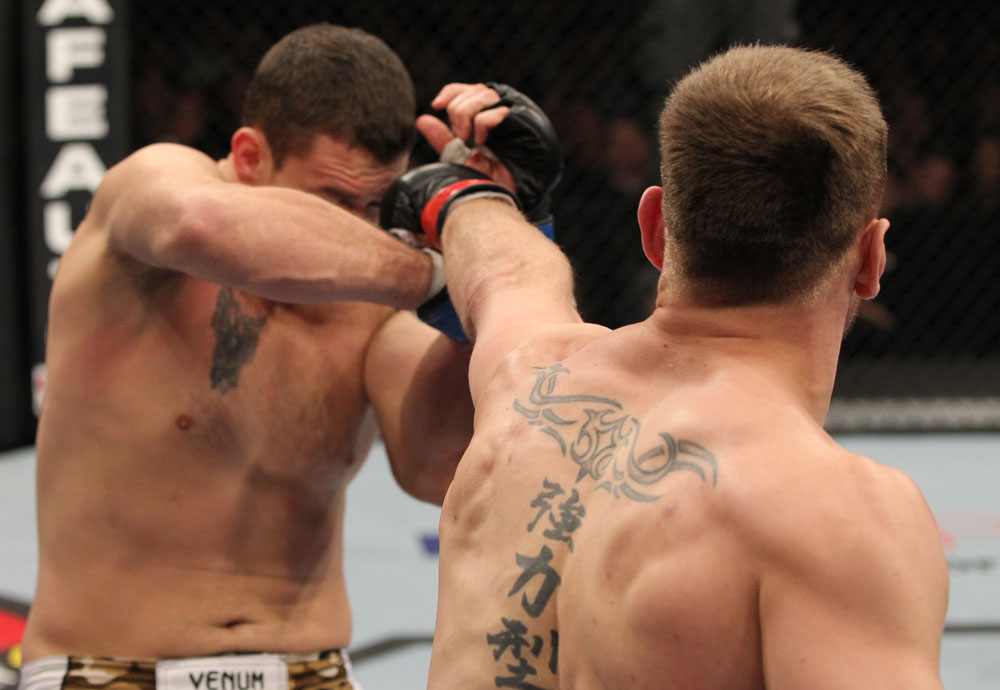 OMAHA, NE - FEBRUARY 15: (R-L) Stipe Miocic punches Phil De Fries during the UFC on FUEL TV event at Omaha Civic Auditorium on February 15, 2012 in Omaha, Nebraska. (Photo by Josh Hedges/Zuffa LLC/Zuffa LLC via Getty Images) *** Local Caption *** Stipe Miocic; Phil De Fries