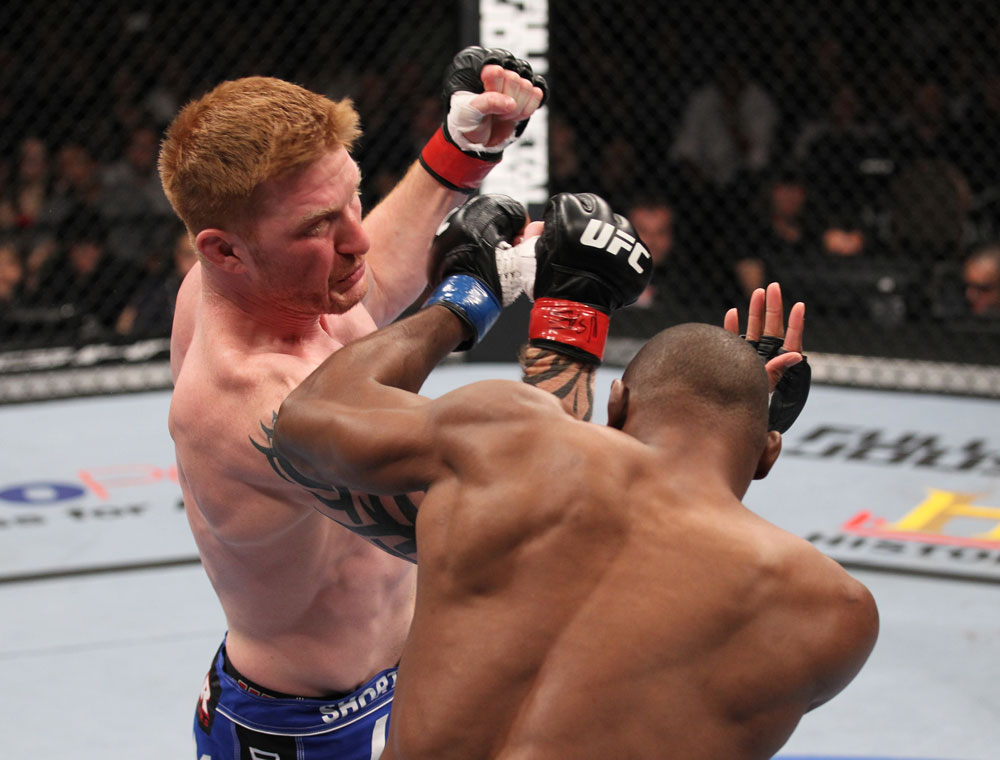 LAS VEGAS, NV - FEBRUARY 04:  Ed Herman (left) punches Clifford Starks during the UFC 143 event at Mandalay Bay Events Center on February 4, 2012 in Las Vegas, Nevada.  (Photo by Nick Laham/Zuffa LLC/Zuffa LLC via Getty Images) *** Local Caption *** Ed Herman; Clifford Starks